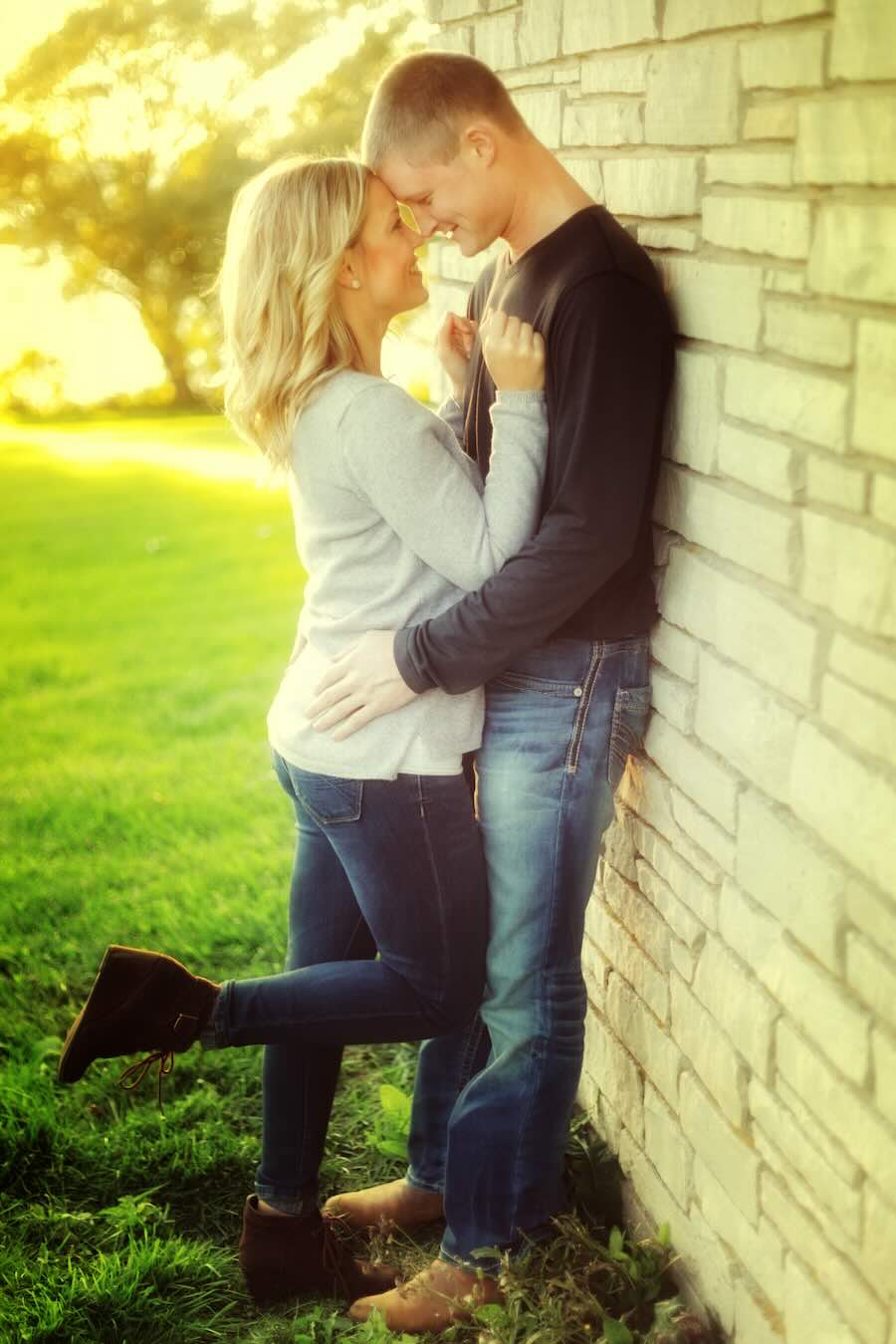 Couple poses at High Cliff State Park for their engagement photo.